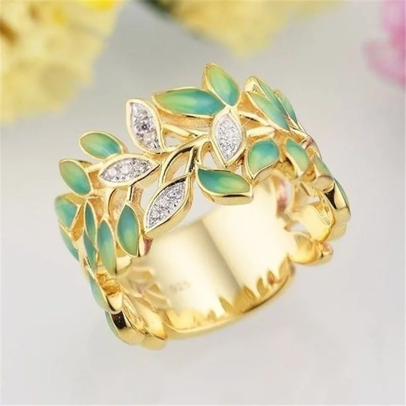 

New inlaid zircon dripping leaf ring European and American female flower ring