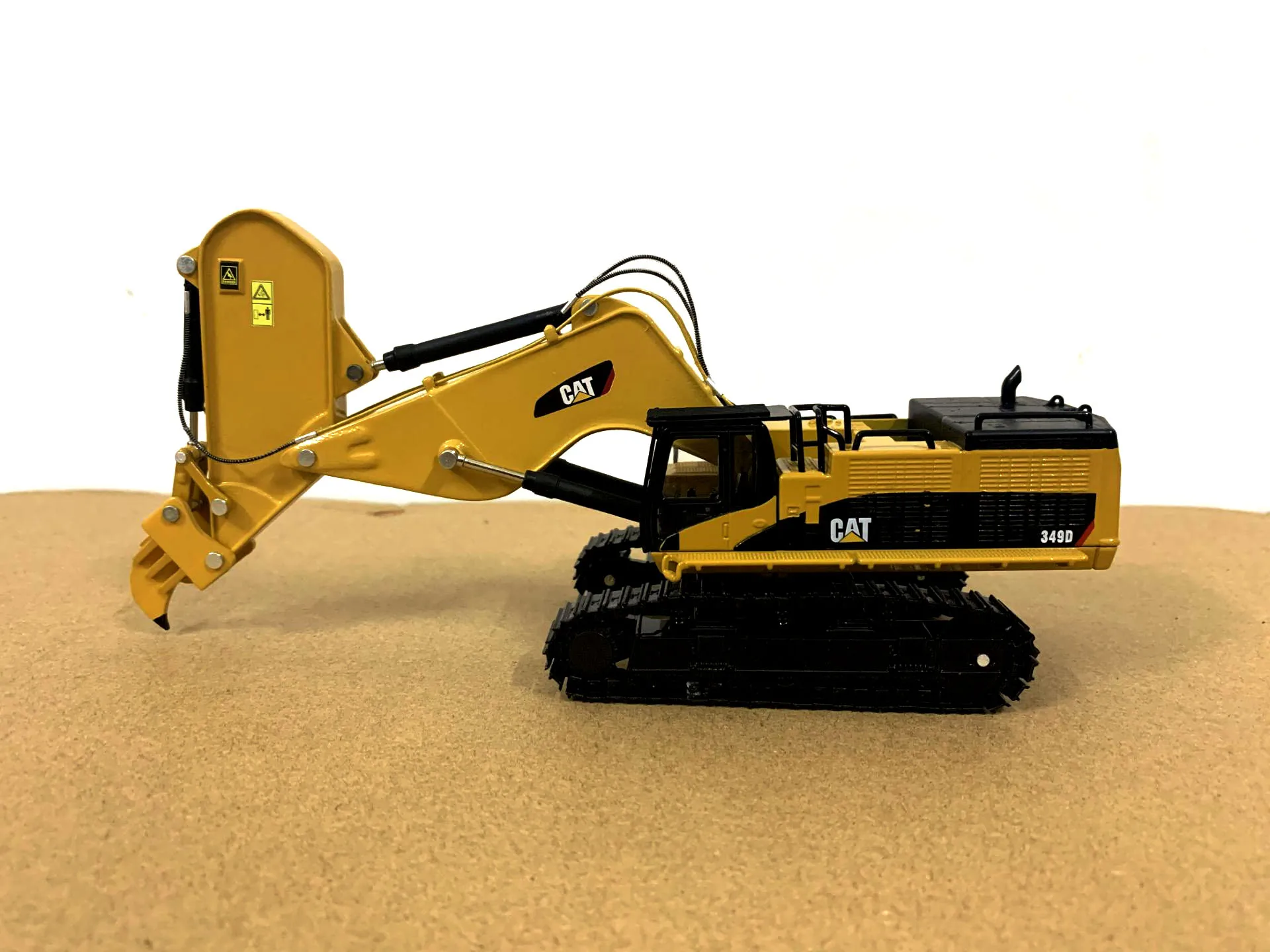 

Гусеничный Экскаватор Caterpillar Cat 349D, модель 1/50 литых строительных автомобилей