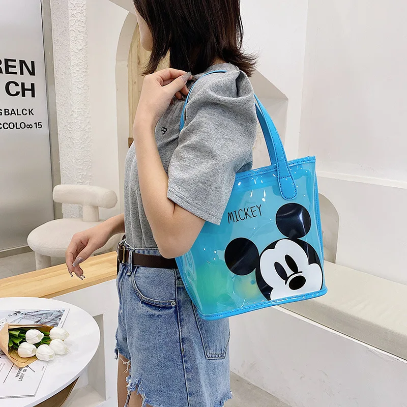 Disney New women bag Mickey Mouse transparent jelly bag cartoon printed handbag Korean cute one shoulder bag slant cross bag