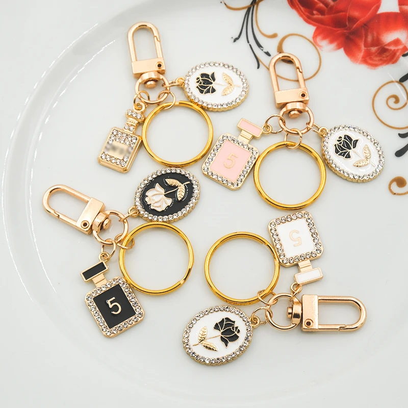 

Sweet And Romantic Rhinestone Perfume Bottle Keychains Fashion Car Key Ring Key Chain Rose Charm Keyrings Accessories Jewelry