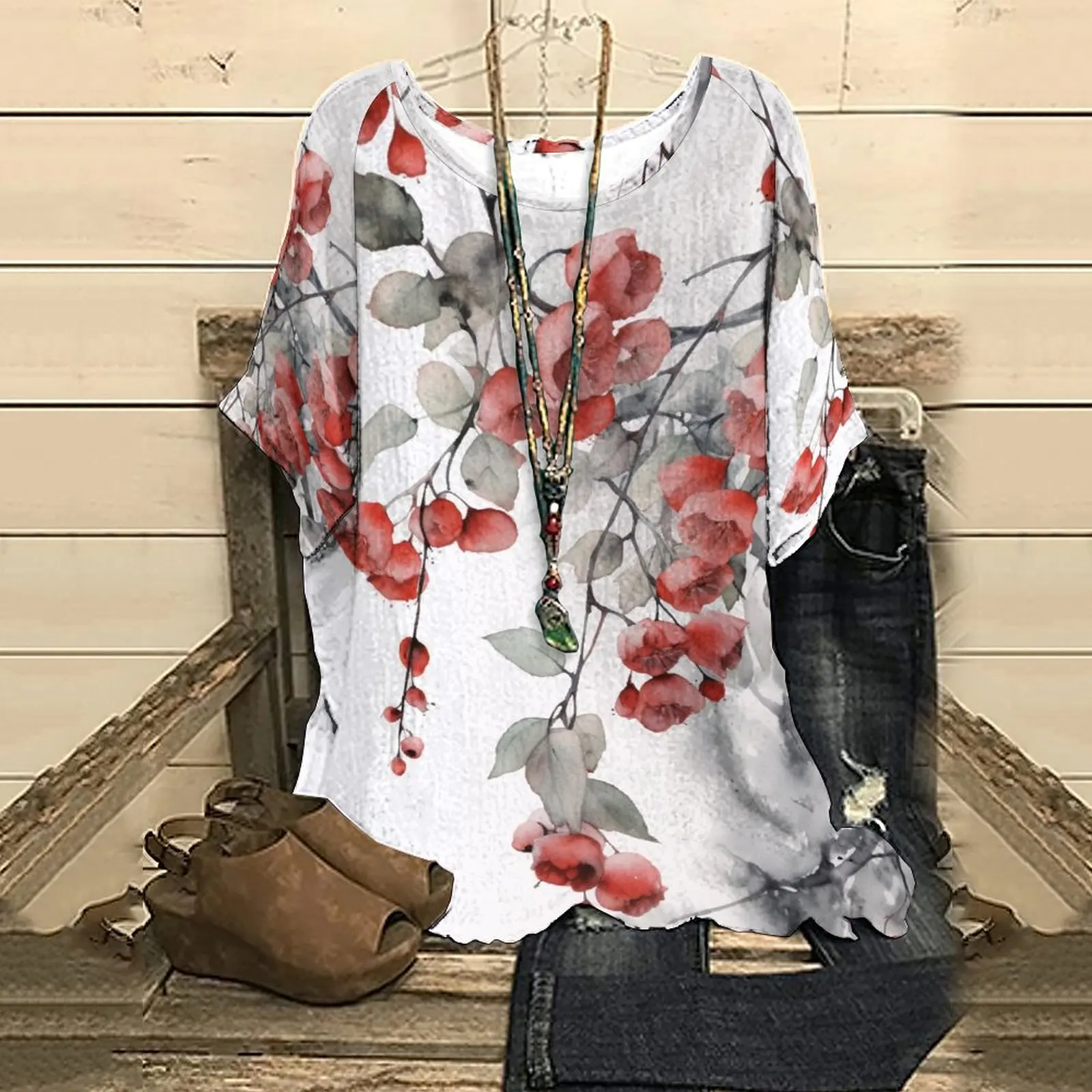 

Женская футболка с коротким рукавом и цветочным принтом