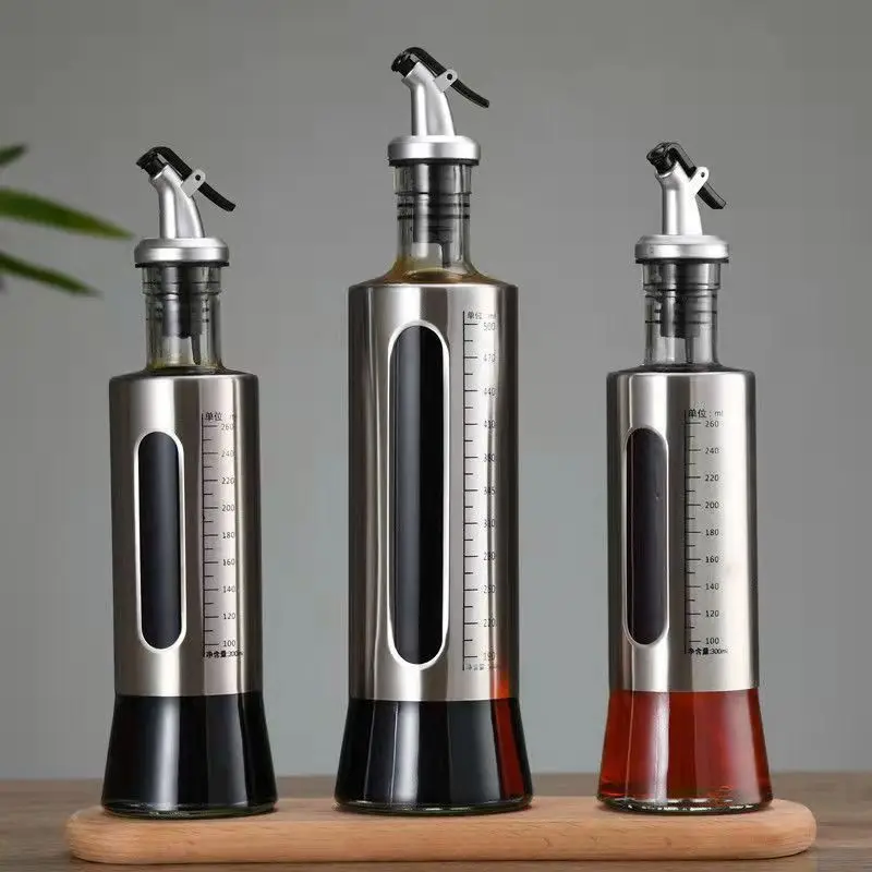 Продажа Стеклянная бутылка для масел большой емкости со шкалой для кухни, соуса, уксуса, вина, для домашнего использования с дозатором масла Скидка Стеклянная бутылка для масел большой емкости со шкалой для кухни, соуса, уксуса, вина, для домашнего использования с дозатором масла