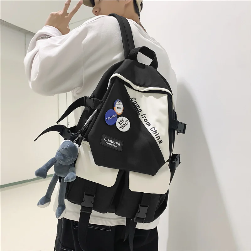 

New Women Men Fashion Backpacks Letter Printing Cool Penelled Nylon Male Laptop Bag Unisex College Student School Bags Trend