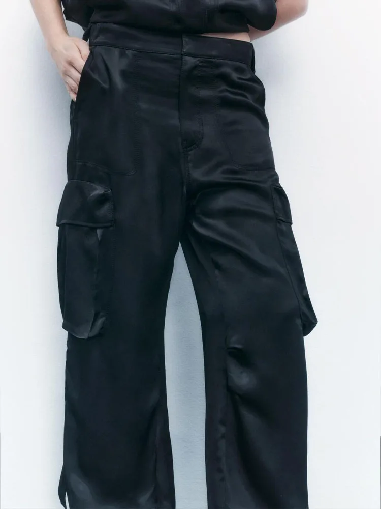 

Женский комбинезон с эластичной застежкой-молнией спереди и металлическим крючком