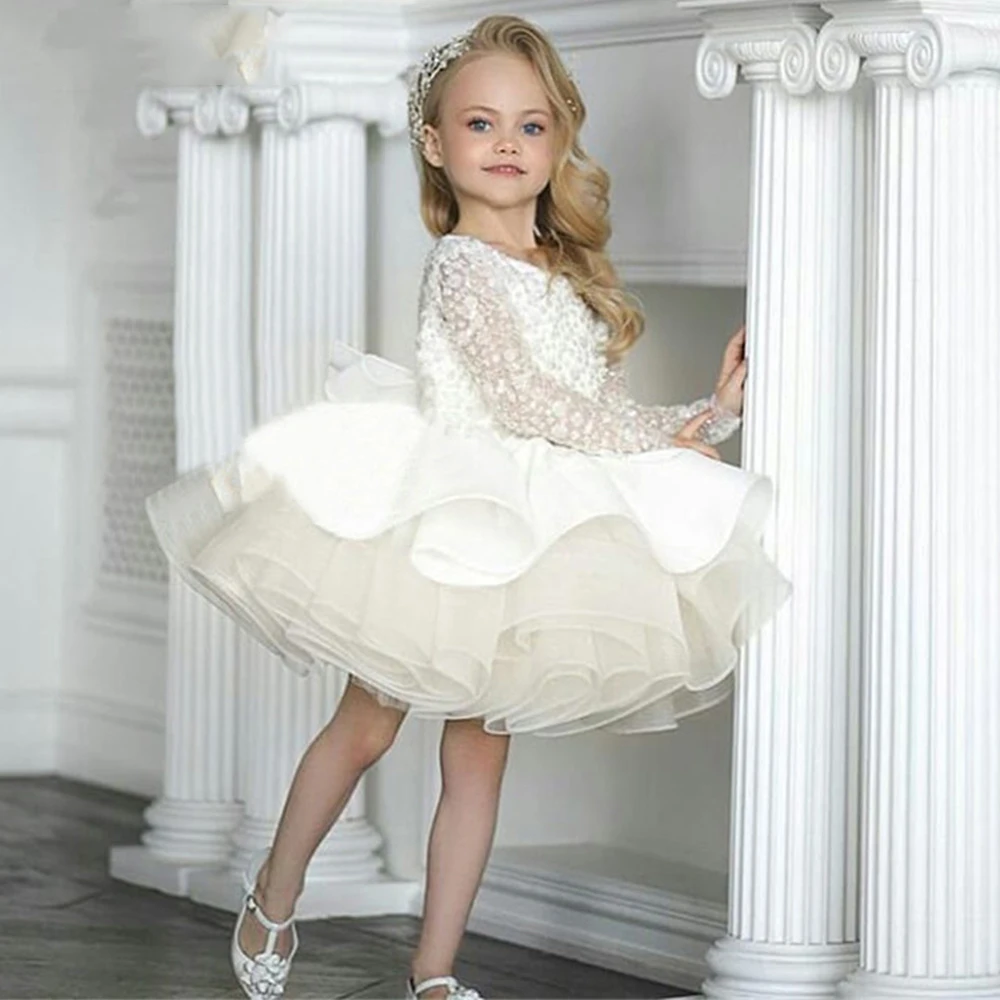 

Очаровательное пушистое Тюлевое ТРАПЕЦИЕВИДНОЕ детское рождественское платье с длинным рукавом и аппликацией цвета слоновой кости Платья...