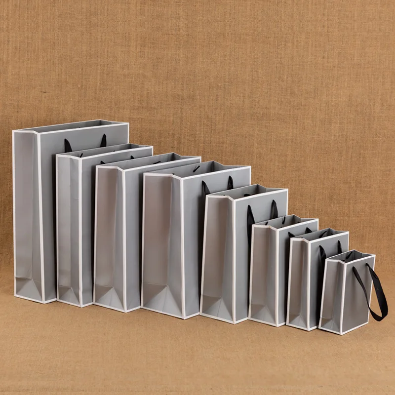 Тонкий серебристо-серый бумажный пакет сумка для подарков подарок на день