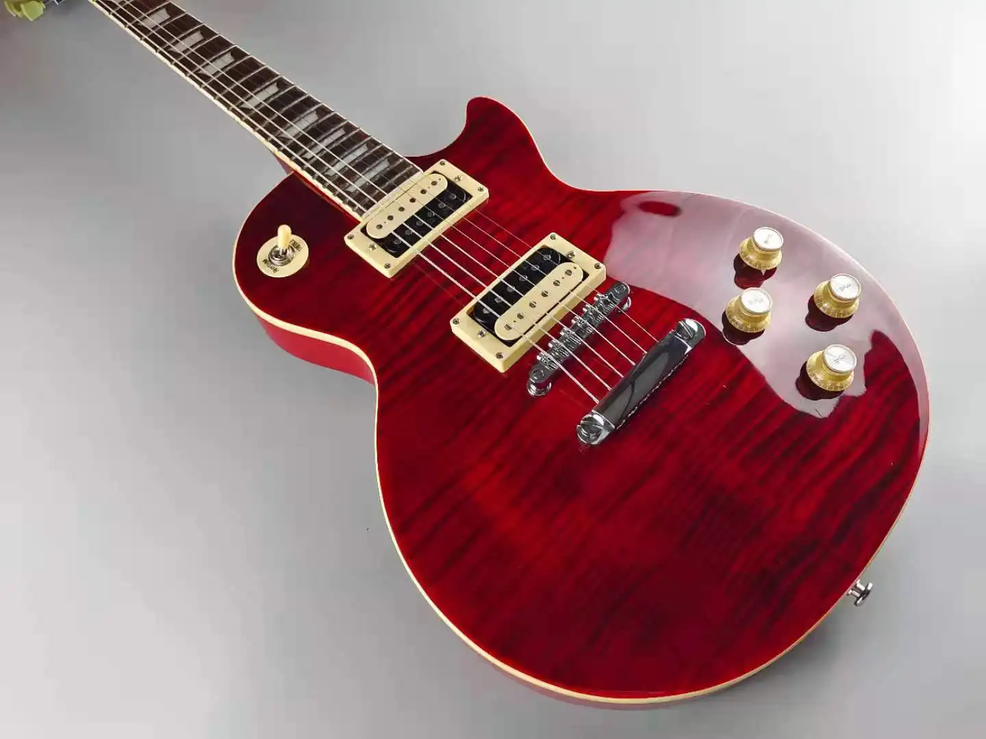 

LP Electric Guitar, Mahogany Body, Rosewood Fingerboard,Wine red, good tiger stripes，Fast Shipping, In Stock