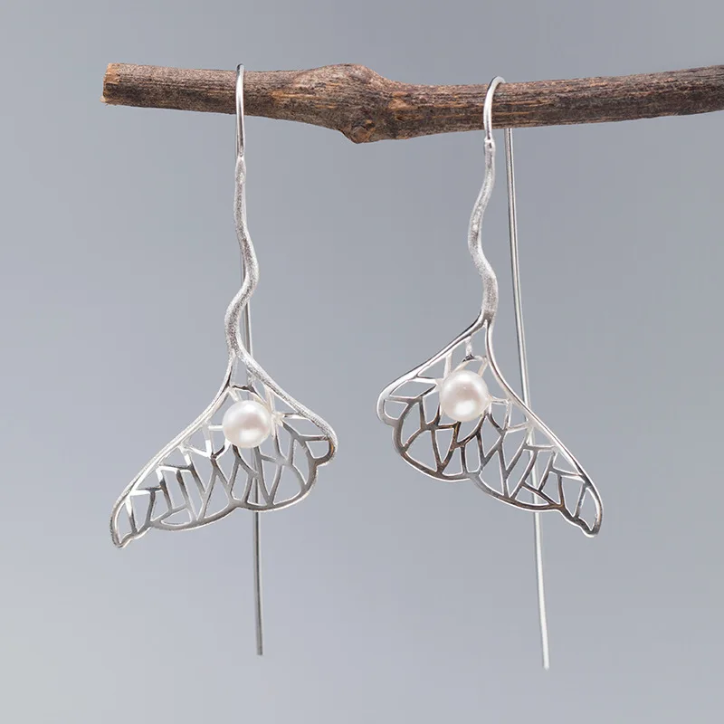 

Женские серьги «рыбий хвост» из серебра 925 пробы с жемчугом