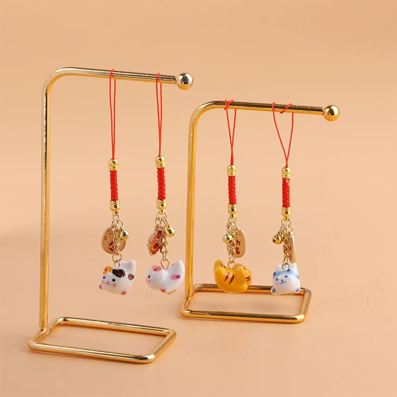 Цепочка для телефона с подвеской в виде кошки