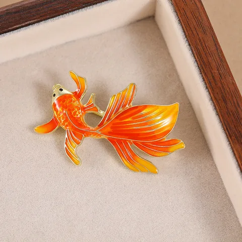 Золотые броши с рыбкой