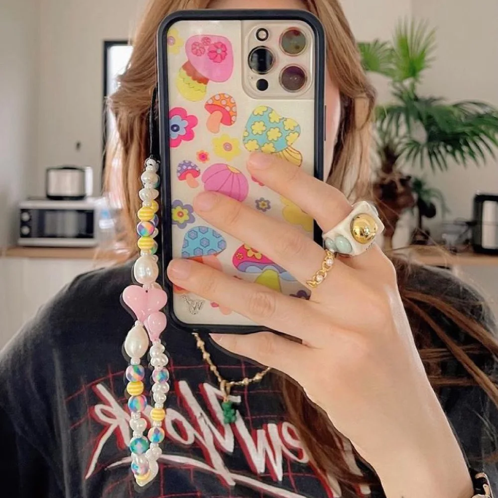 

Новый корейский ремешок для телефона в виде розы с имитацией жемчуга и сердца, ремешок для подвешивания на запястье для девушек Y2K Jewelry Van Daisy