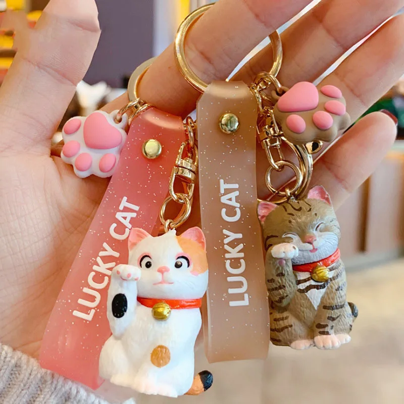 

Creative Cute Pocket Beckoning Lucky Cat Keychain Cartoon Epoxy Grinning Cat Keyfob Girl Bag Couple Gift Keyring Wholesale