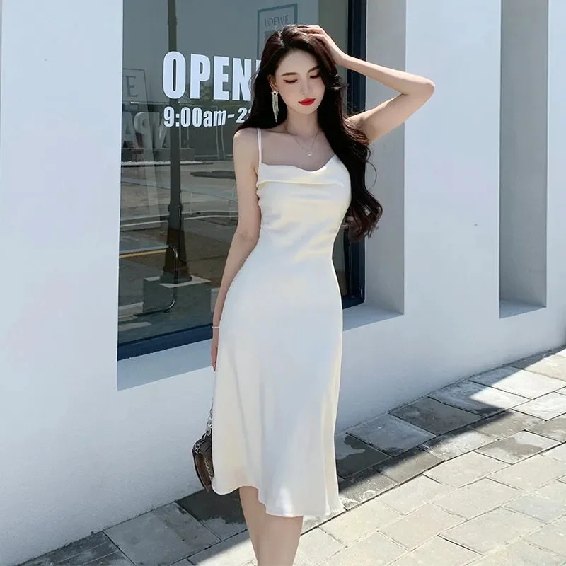 French white suspender skirt 2022 summer new temperament outer wear thin bottoming skirt high-end chic satin swing collar dress