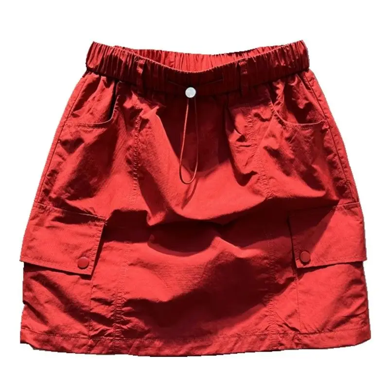 Летняя облегающая юбка А-образной формы с несколькими карманами и эластичной