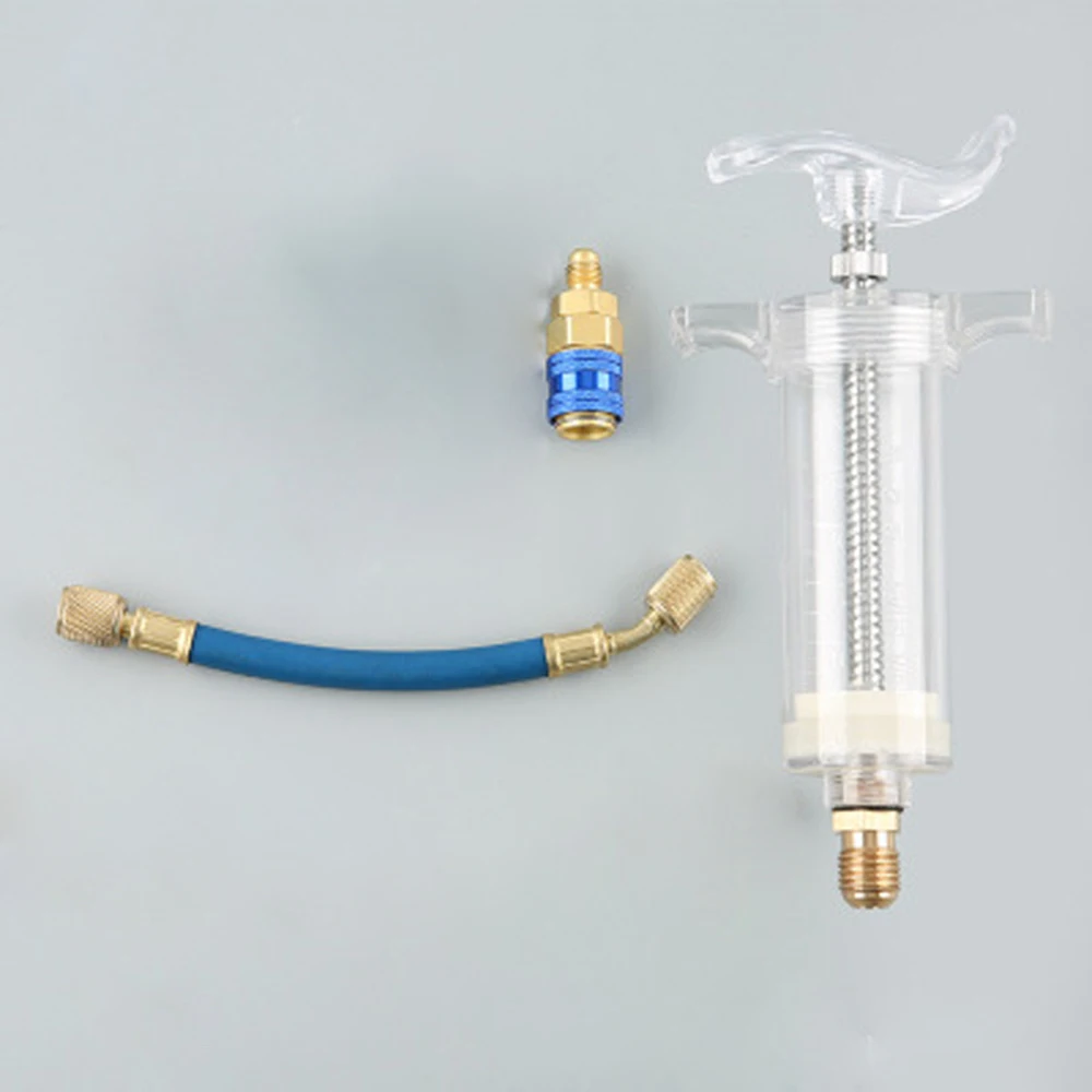 

The Real Color Of The Item May Be Slightly DiffereOil/Dye Injector 30Ml 1 Oz With Low Side Quick Coupler Adapter 1/4 SAE X4T7