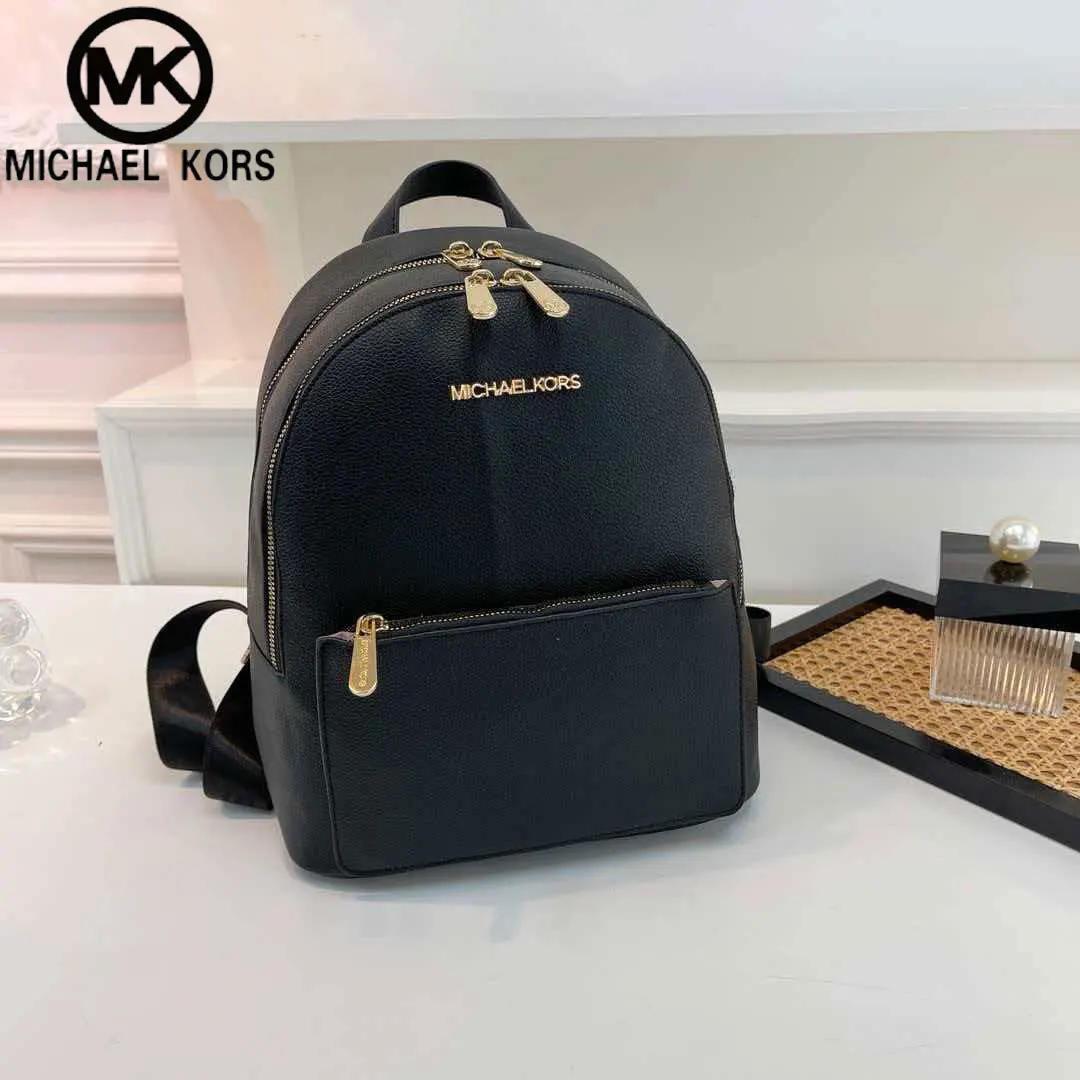 Фото Michael Kors Sheila Series 2026 Новый модный городской женский повседневный дорожный рюкзак большой вместимости, простой, из водонепроницаемого ПВХ-материала №5