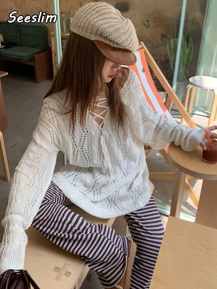 

Женский свитер с V-образным вырезом, на шнуровке