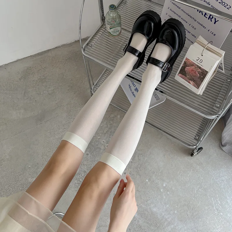 Ultra-thin JK milk-white calf socks in spring and summer, black pantyhose, Japanese lolita sweet white silk.