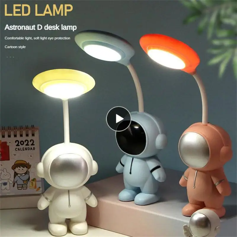 

Cute Table Lamp Unique And Interesting Soft Light Eye Protection Learning Light Can Be Folded 360 ° Astronaut Shape Portable