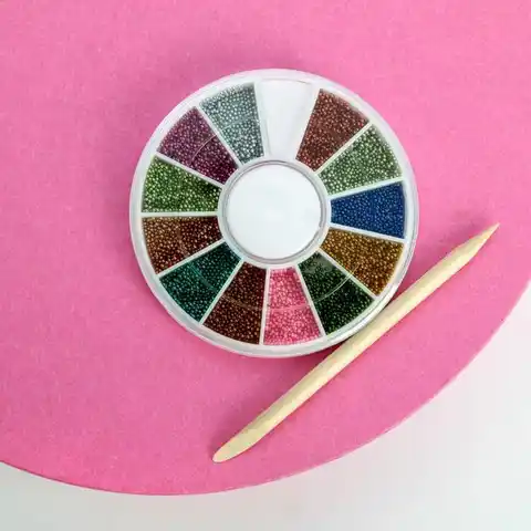 A set of nail decoration (12 colors) and an orange stick Born to Sparkle