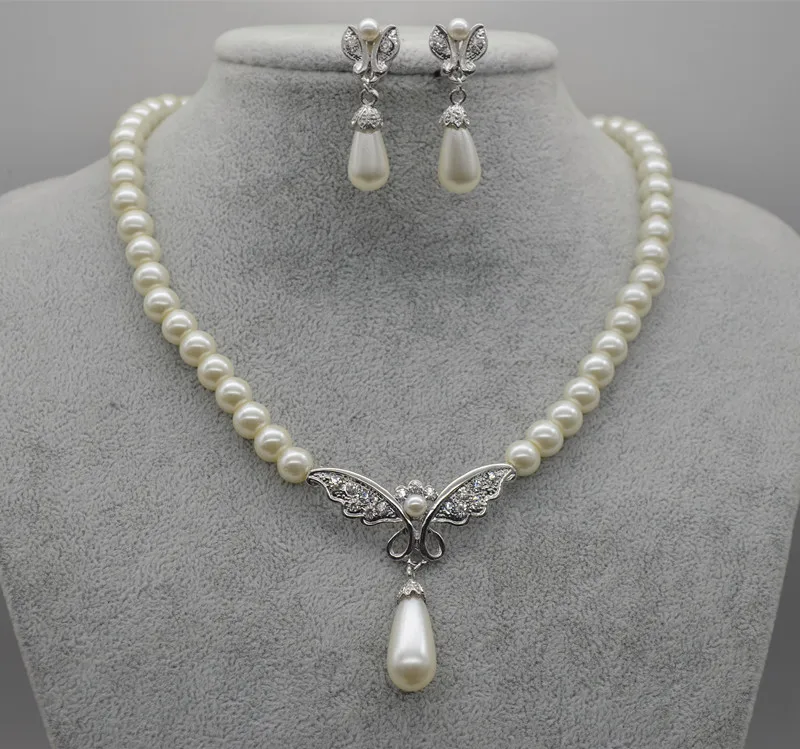 

Серебряный цвет, слоновая кость, Стеклянный Жемчуг и стразы, Свадебный бант, ожерелье, серьги, ювелирные наборы