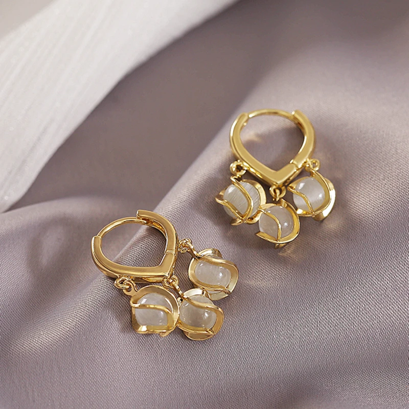 

2022 Design Sense Pendant Gold Cat Eye Earrings Women Fashion Jewelry Party Girl Elegant Simple Earrings Luxury Accessories Gift