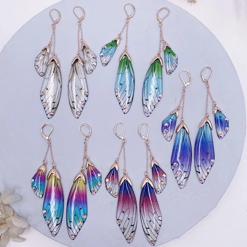 

Fairy Resin Butterfly Earrings for Women Shining Crystal Flake Double Wing Long Drop Earrings Ladies Wedding Party Jewelry 2022