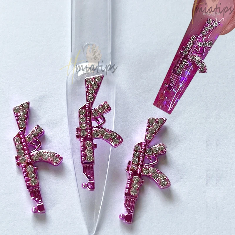 

Лидер продаж, розовые подвески для ногтей в форме пистолета из сплава, роскошный кролик «сделай сам», блестящие украшения для ногтевого диз...