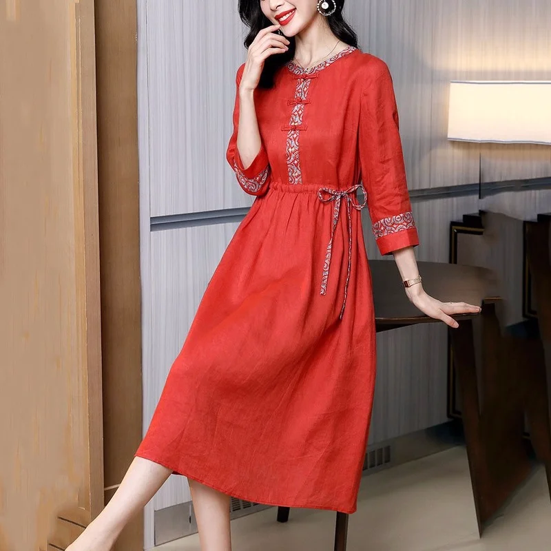 

Orange cotton and linen dress female 2022 early autumn retro literary loose waist long section linen long sleeve o neck dress