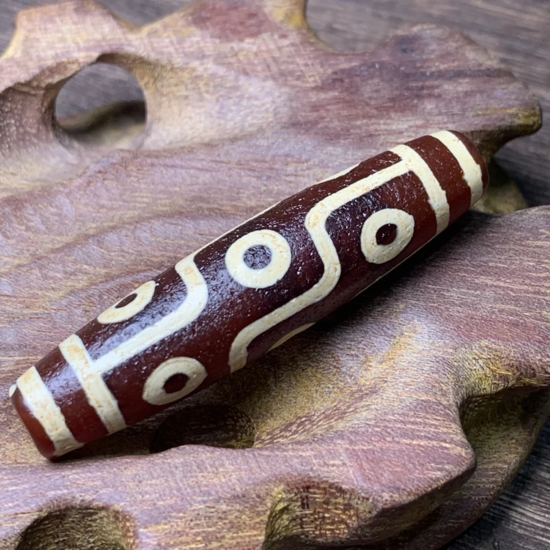 

Tibetan best quality high-oil-packed ox blood red nine-eyed dzi