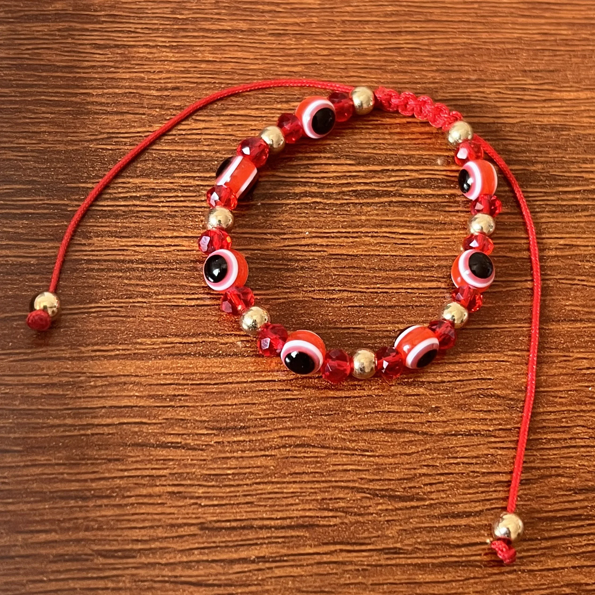 

12 шт. детский размер глаза демона Кристалл Плетеный молитва приносит хорошую фотографию