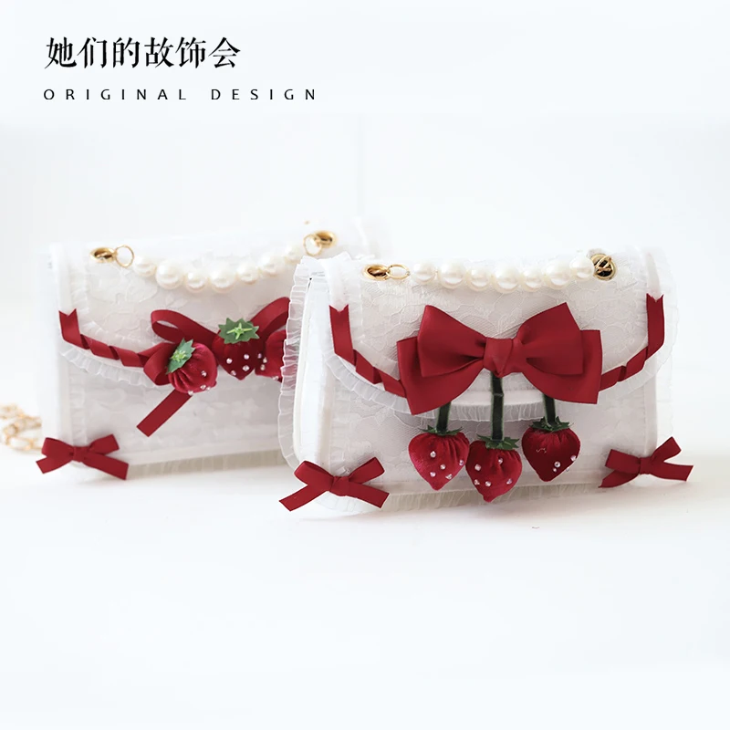 

Милая женская сумка через плечо Lolita JK, с кружевом и жемчужной цепочкой, с бантом и клубничкой, универсальная оригинальная сумка через плечо