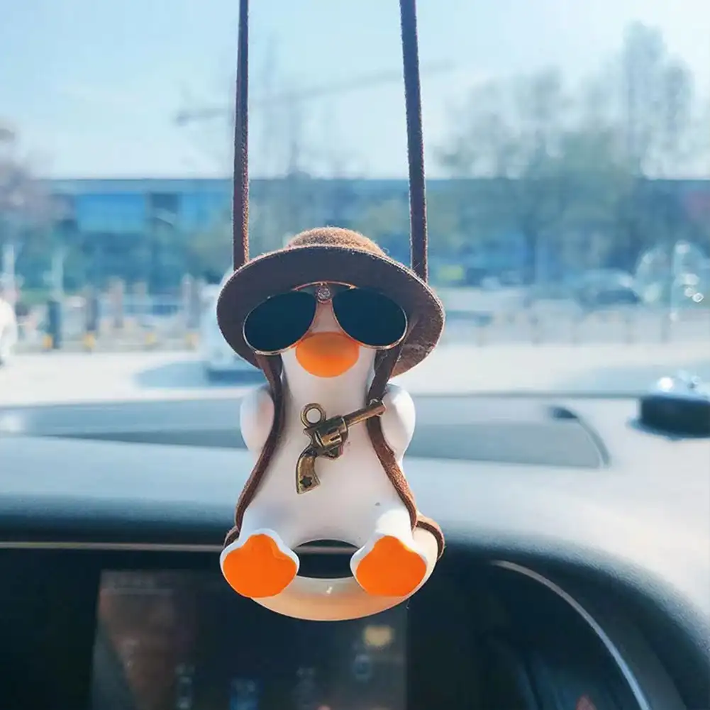 

Cute Anime Cowboy Pipe Duck Car Rearview Mirror Pendant Super Cool Revolver Car Decor Pendant Auto Interior Ornament Decoration