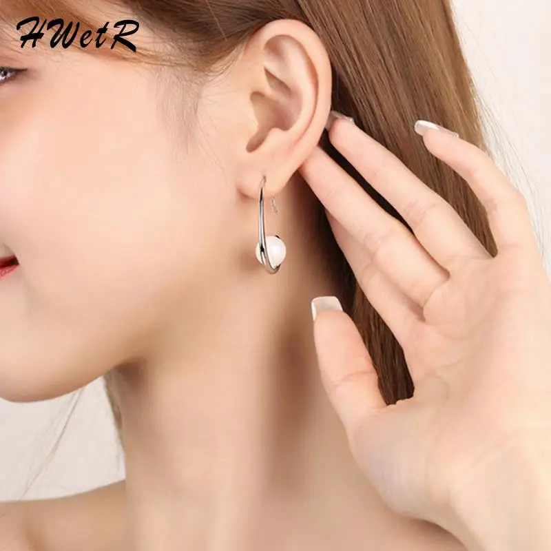 

Женские серьги-подвески с жемчугом