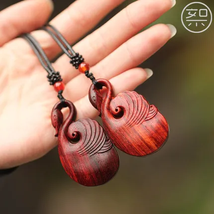 Exquisite small leaf rosewood swan pendant