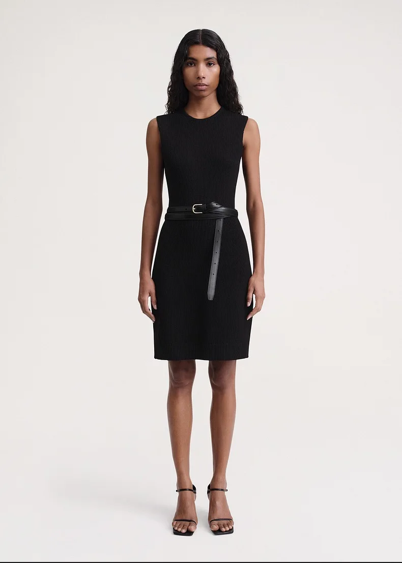 

2023 autumn light luxury slimming MIDI skirt 100 round neck sleeveless sweater black dress bag hip elastic skirt