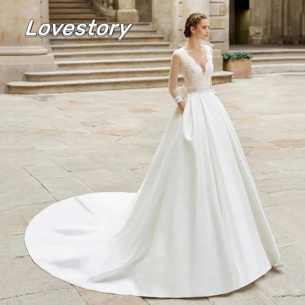 

Lace A-Line Boho Wedding Dresses Sexy V-Neck Three Quarter Sleeves Bride Robes Pockets Bow Bridal Gown Buttons Vestidos De Noiva