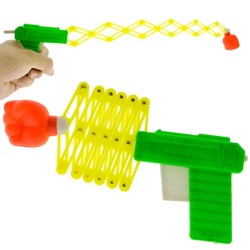 

Hot Funny Retractable Fist Shooter Trick Toy Funny Child Kids Plastic Party Festival Gift Classic Elastic Telescopic Fist Toy