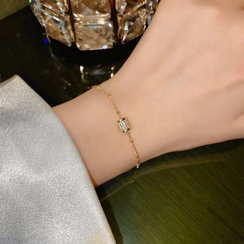 

Golden drawstring niche zircon bracelet women's simple personality circle titanium steel bracelet cold wind wild bracelet