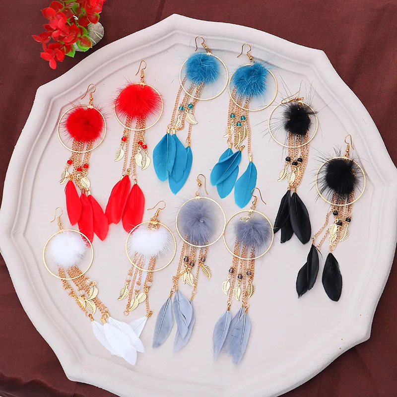 

Three-dimensional hairball feather earrings female Europe and America fashion long tassel earrings bridal red earrings kolczyki