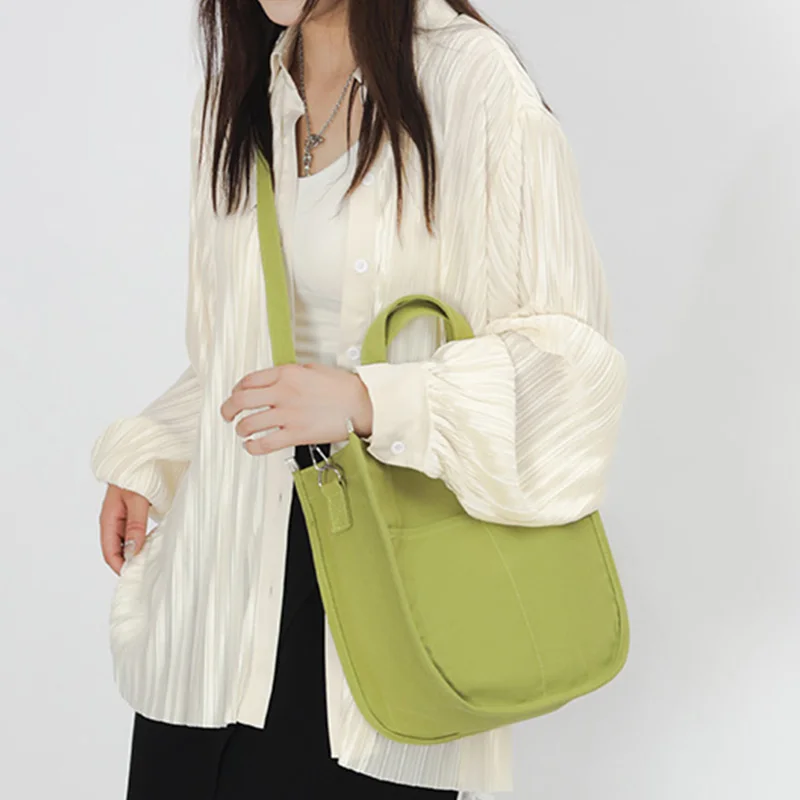 

Simple canvas bags for women 2022 soft luxury design Handbag office lunch tote bag small messenger Shoulder Books Bag For Girls