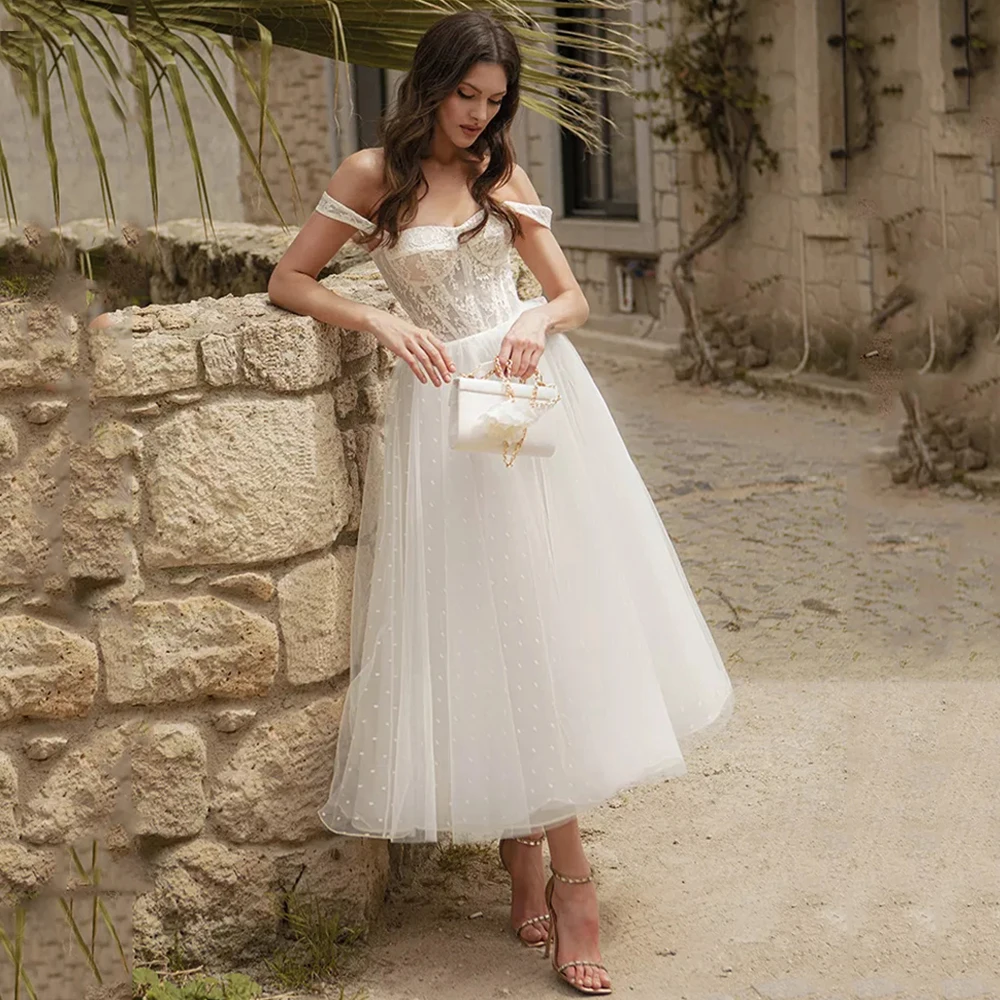

Princess Boho Wedding Dresses Sweetheart Sleeveless Tulle Wedding Dress Off Shoulder Appliques Dots Tea Length Open Back Gowns