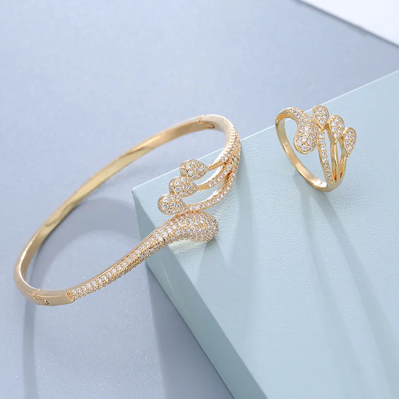 

High-Quality Women’s Hollow Water Flower Fashion Temperament Set AAA ZIRCON 2PCS Bracelet Ring Set Wedding Party Gift Jewelry
