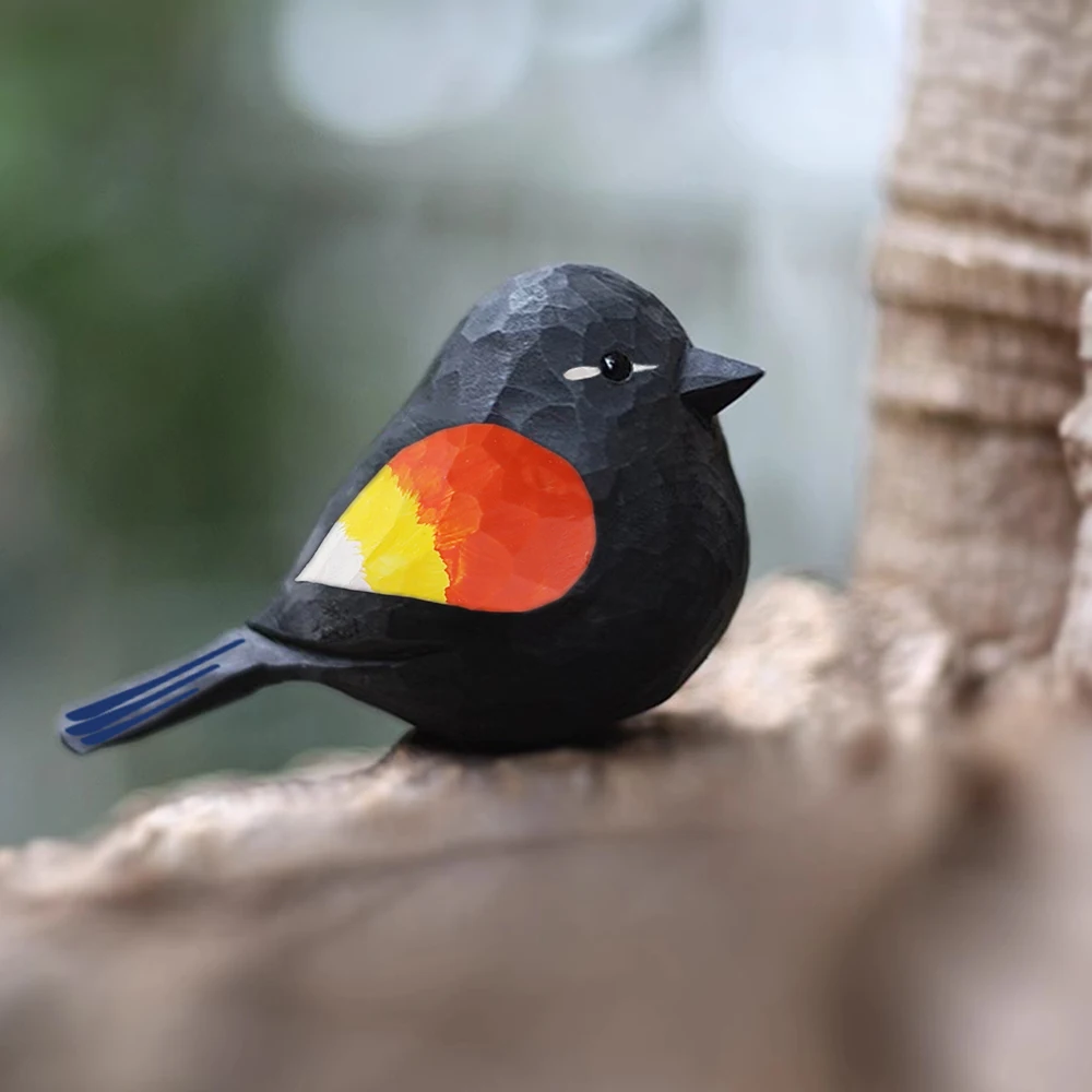 

Деревянная статуэтка чёрной птицы