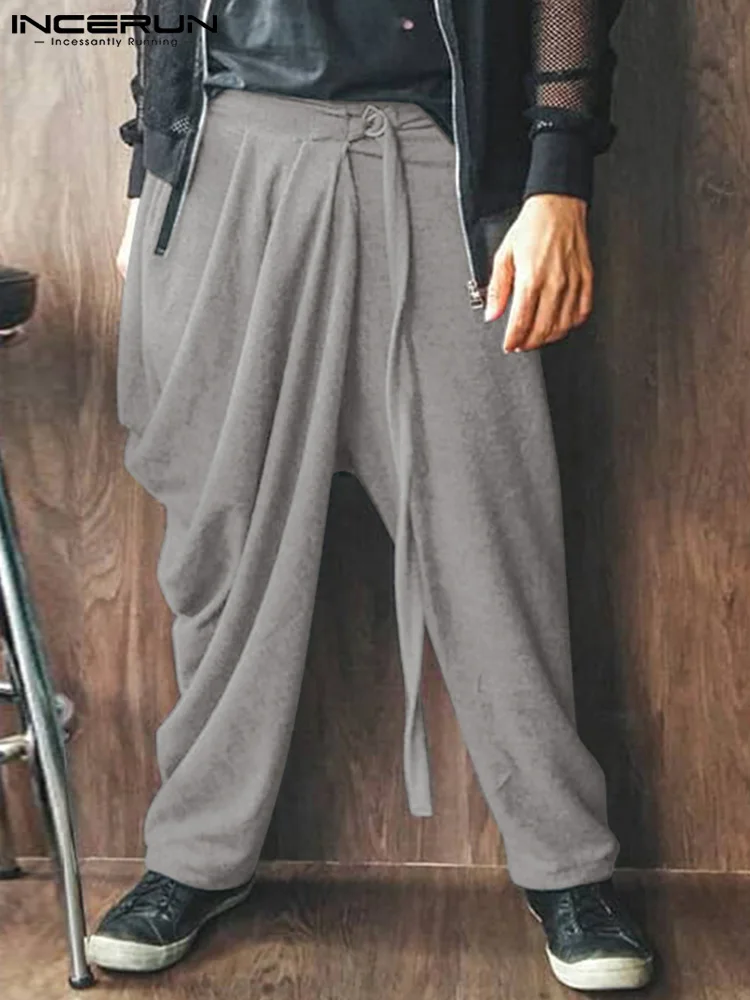 

INCERUN Men Pants Solid Color Lace Up Joggers Loose Fleece Fashionable Casual Asymmetrical Trousers Men Streetwear Pantalon 2022
