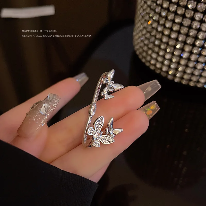 

Minar Sweet Single Piece Bling Rhinestone Butterfly Clip Earrings for Women Silver Color Metal Simulation Wings Hanging Earring