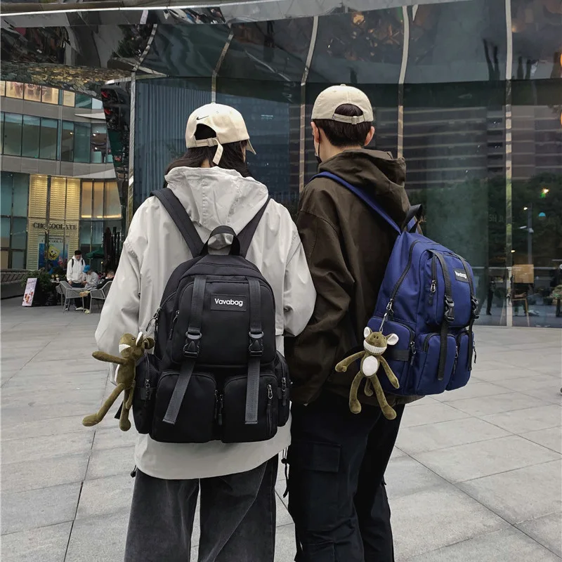 

Spring 2023 new products in Europe and the Oxford cloth leisure bag contracted style, pure color double pocket student backpack