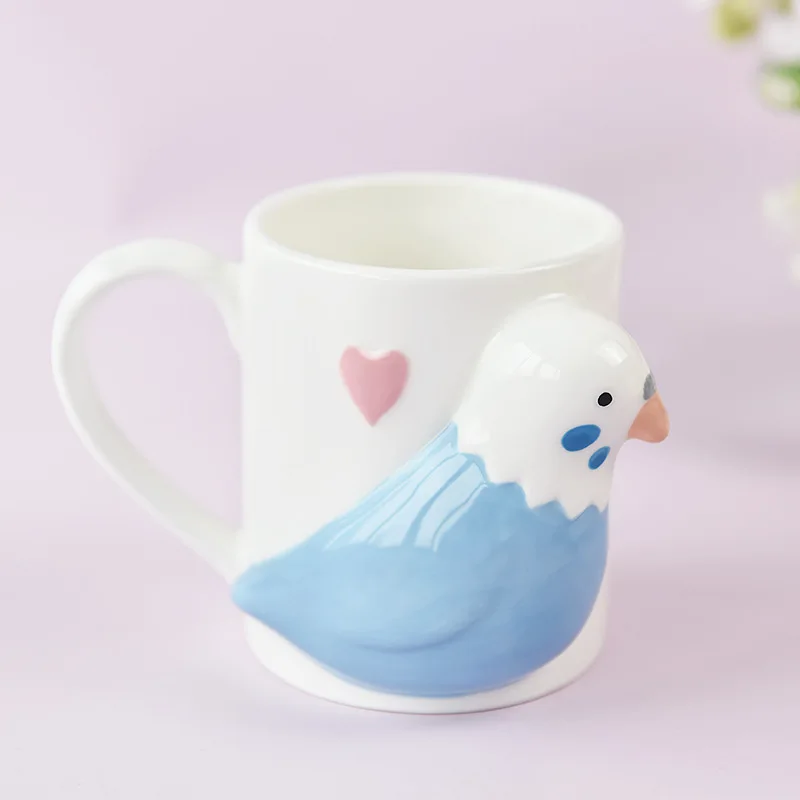 

Керамическая чашка с птицей