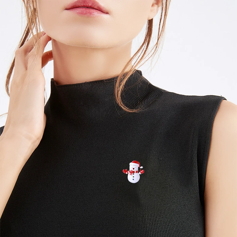 

Enamel Christmas snowman brooch with drops of oil