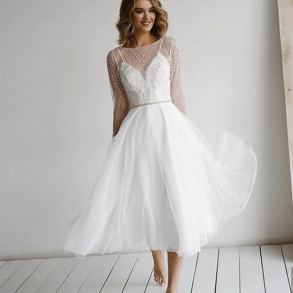 

Classic Wedding Dresses O-Neck Long Sleeves Illusion Backless Lace Applique Bride Gowns Tulle A-Line Mid Calf Vestido De Noiva